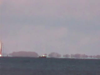 Bateau au loin, sur fond de mirage